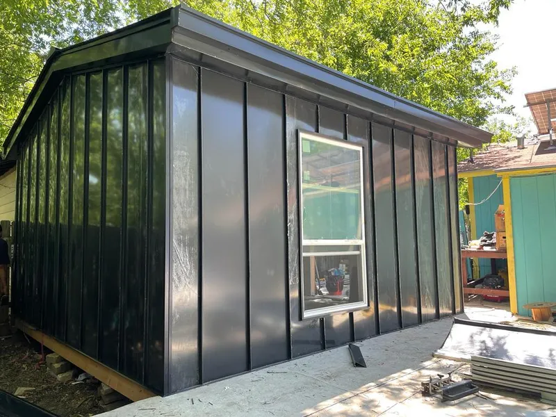 Black standing seam metal wall panels for Roof Inspection in White City